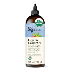 Sky Organics organic castor oil bottle for promoting hair growth, moisturizing skin, and conditioning brows and lashes.