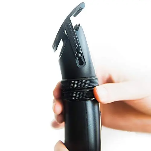 Electric hair clipper with ceramic and titanium alloy blade, rechargeable via USB for haircuts and styling.