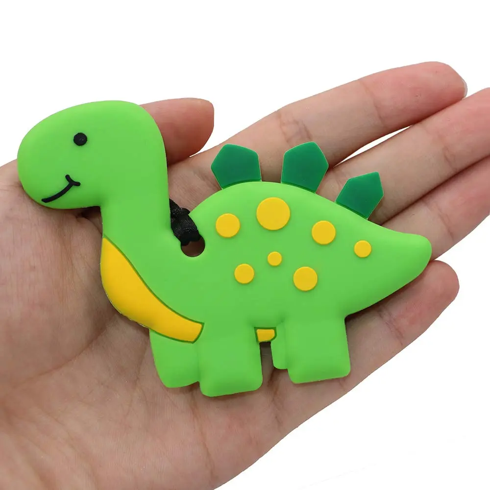 A green dinosaur chew necklace provides a safe and discreet sensory outlet for kids with ADHD, autism, or sensory processing disorder, offering a durable and textured surface for teething and oral motor needs.