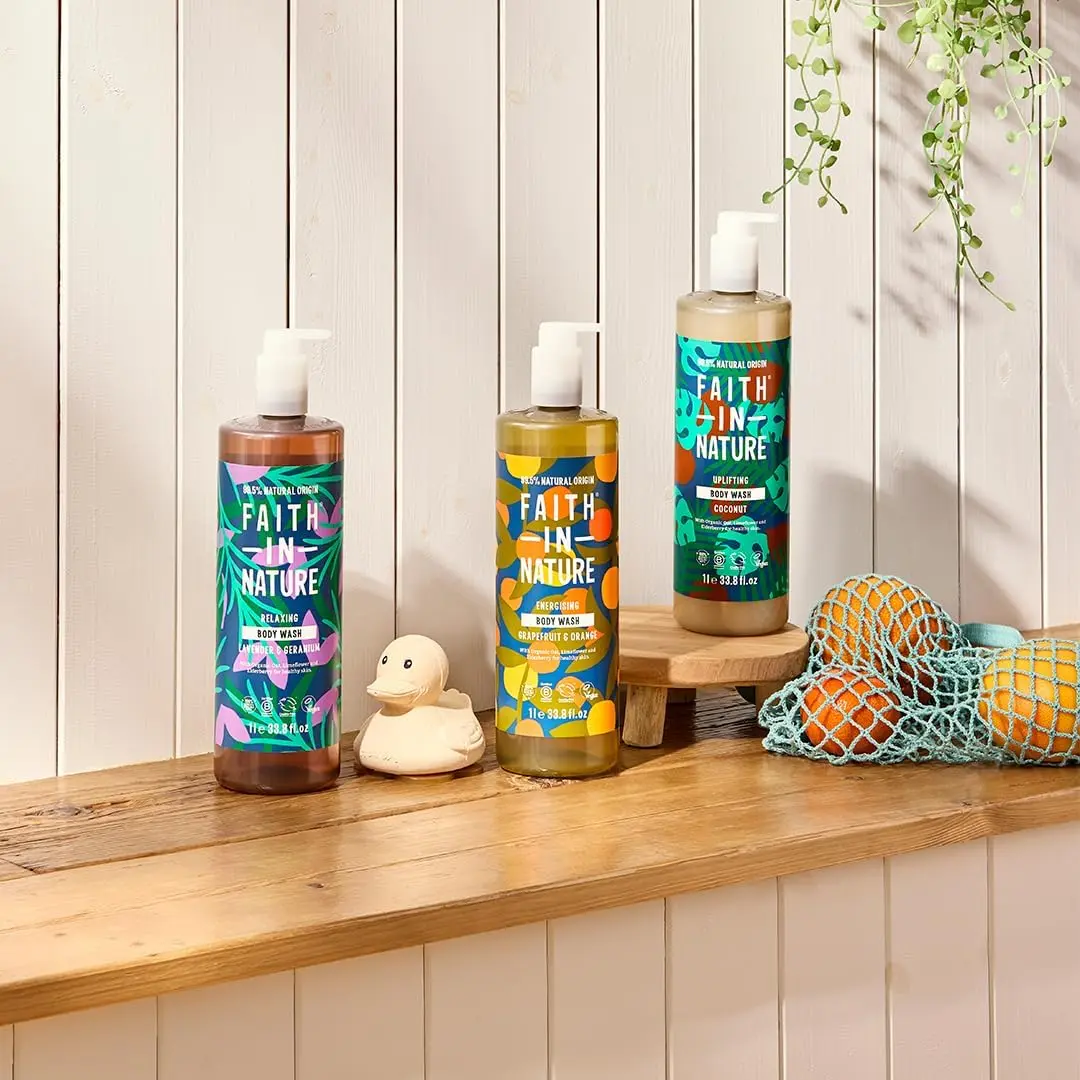 A large bottle of Faith In Nature organic coconut body wash, a vegan and cruelty-free shower gel with a natural coconut aroma.