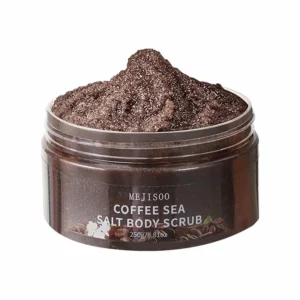 Coffee and sea salt body scrub gently exfoliates and removes tan, revealing smooth skin.