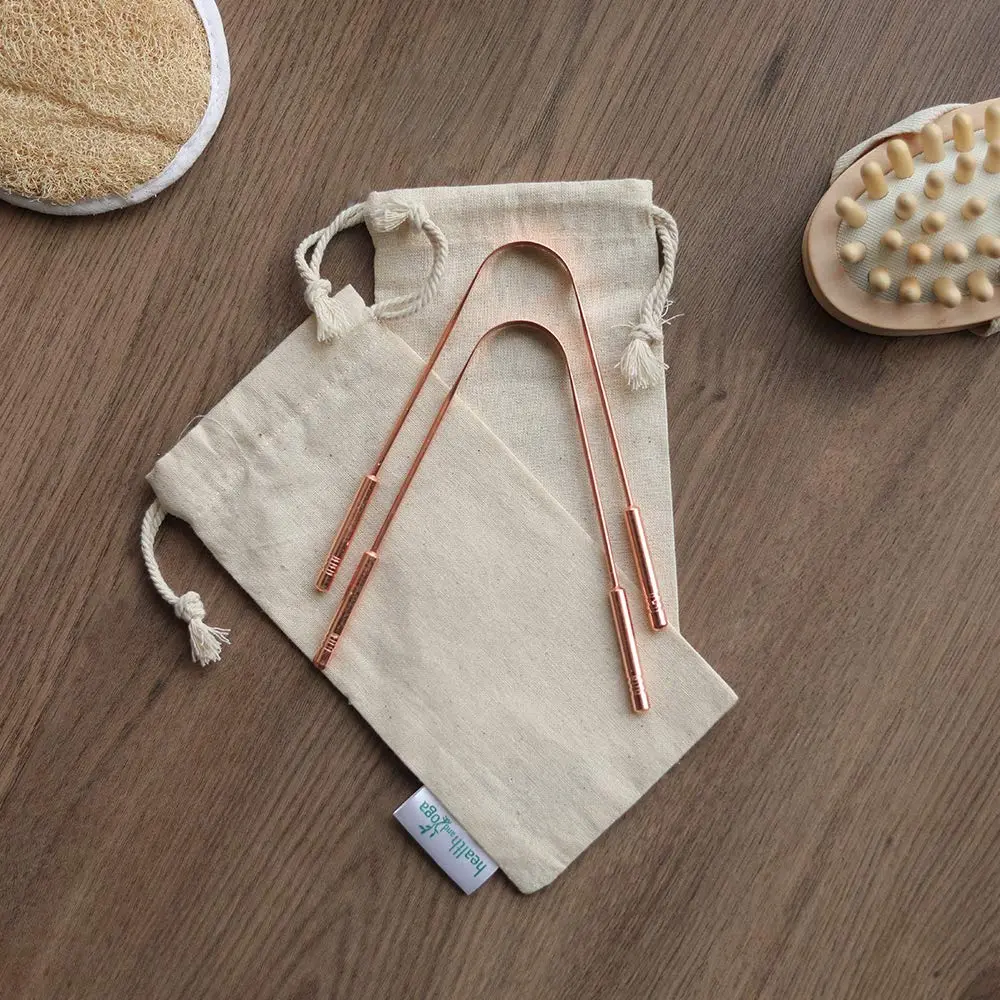 This high-quality copper tongue cleaner with stainless steel comfort grip handles gently removes bacteria and plaque for improved oral hygiene and fresh breath.