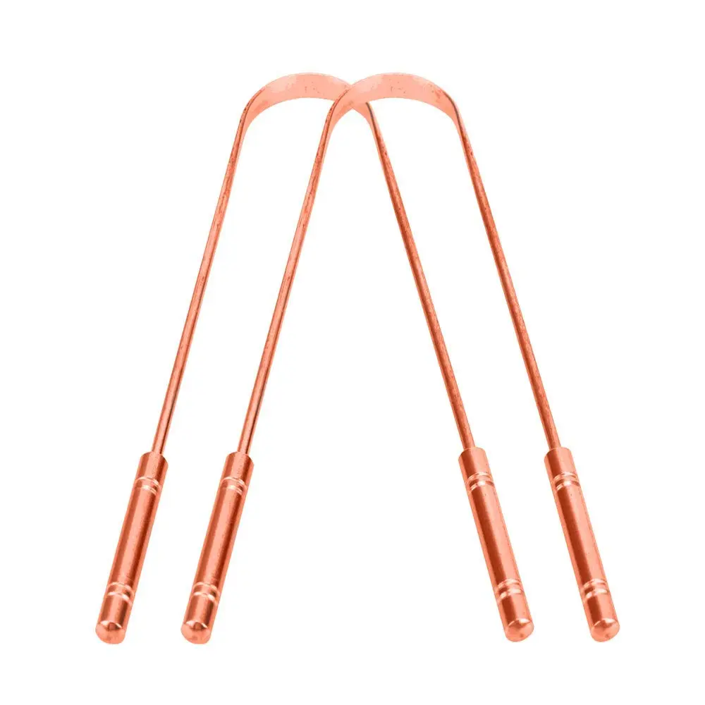 Two copper tongue cleaners made in India with comfortable grip handles for effective bacteria removal and improved oral hygiene.