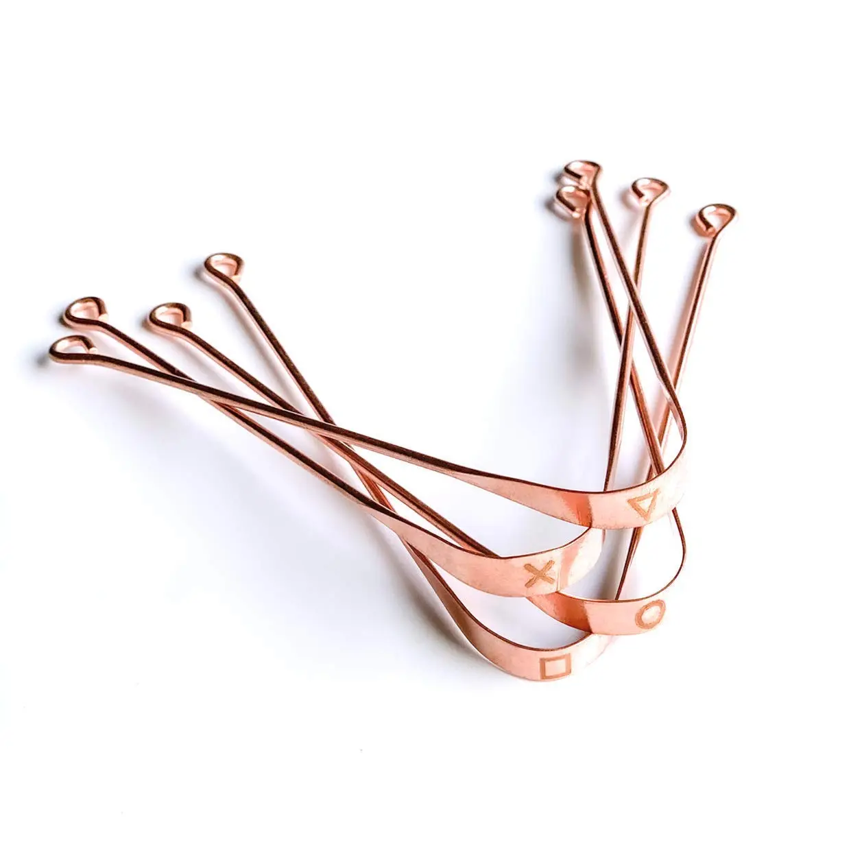 Two pure copper tongue scrapers for adults, designed for effective bacteria removal and improved oral hygiene.