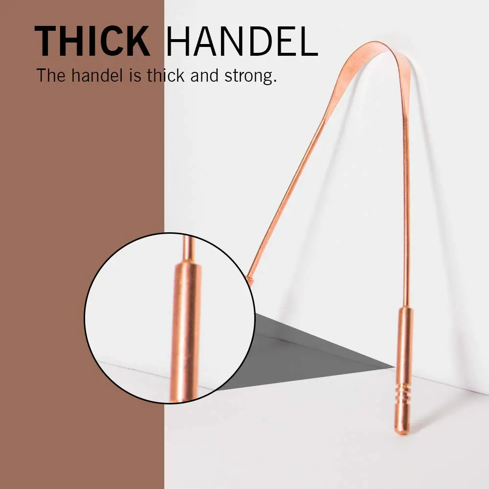 Two copper tongue cleaners made in India with comfortable grip handles for effective bacteria removal and improved oral hygiene.