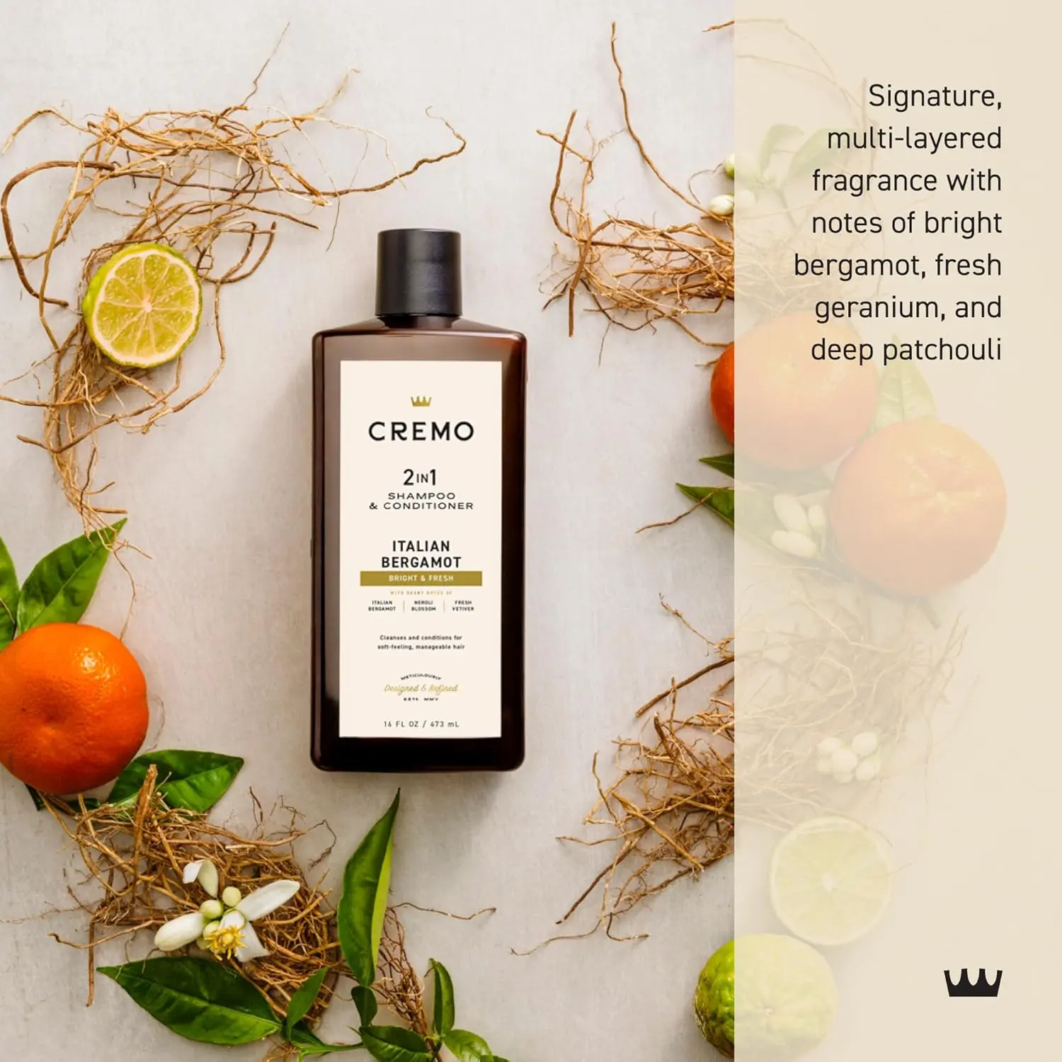 Bottle of Cremo Italian Bergamot 2 in 1 shampoo and conditioner for men, featuring a refreshing scent of neroli blossom and fresh vetiver for all hair types.