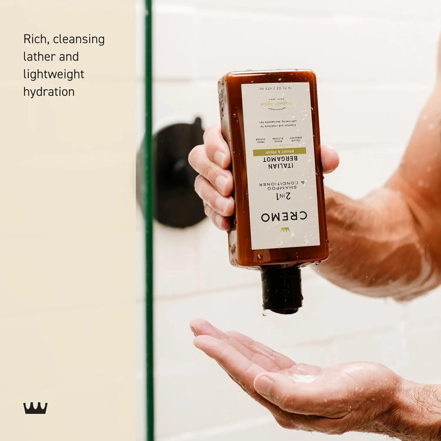 Bottle of Cremo Italian Bergamot 2 in 1 shampoo and conditioner for men, featuring a refreshing scent of neroli blossom and fresh vetiver for all hair types.