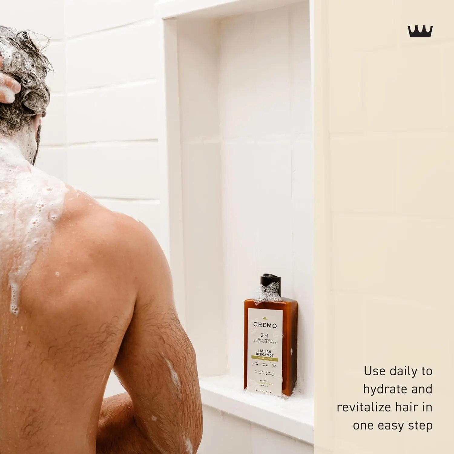 Bottle of Cremo Italian Bergamot 2 in 1 shampoo and conditioner for men, featuring a refreshing scent of neroli blossom and fresh vetiver for all hair types.