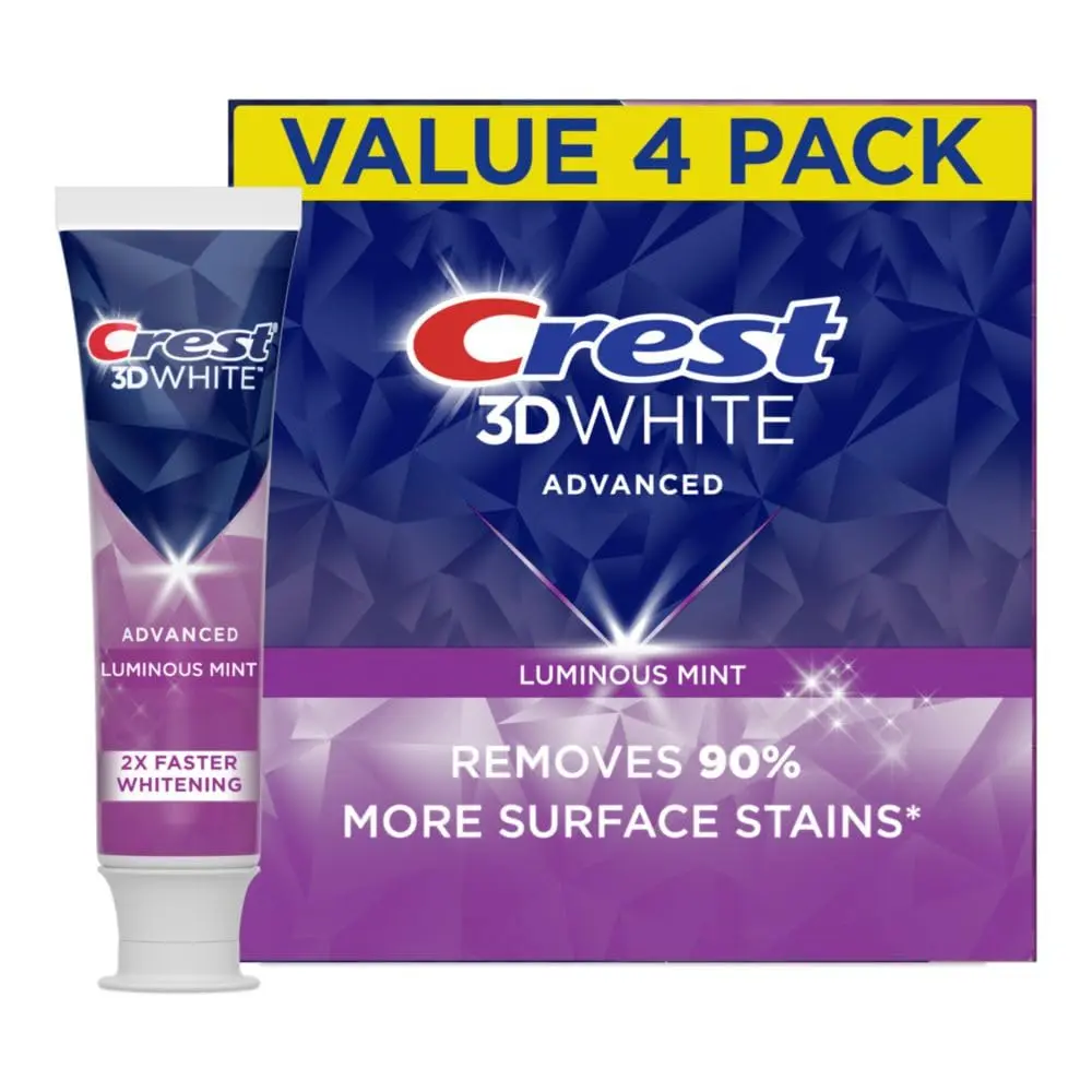 Four tubes of Crest 3D White Advanced Luminous Mint toothpaste for teeth whitening and cavity protection.