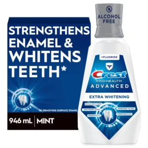 A bottle of Crest Pro-Health Advanced Mouthwash in Energizing Mint flavor, alcohol-free formula that safely whitens teeth by removing surface stains, strengthens enamel, prevents cavities, and kills bad breath germs without the burn.