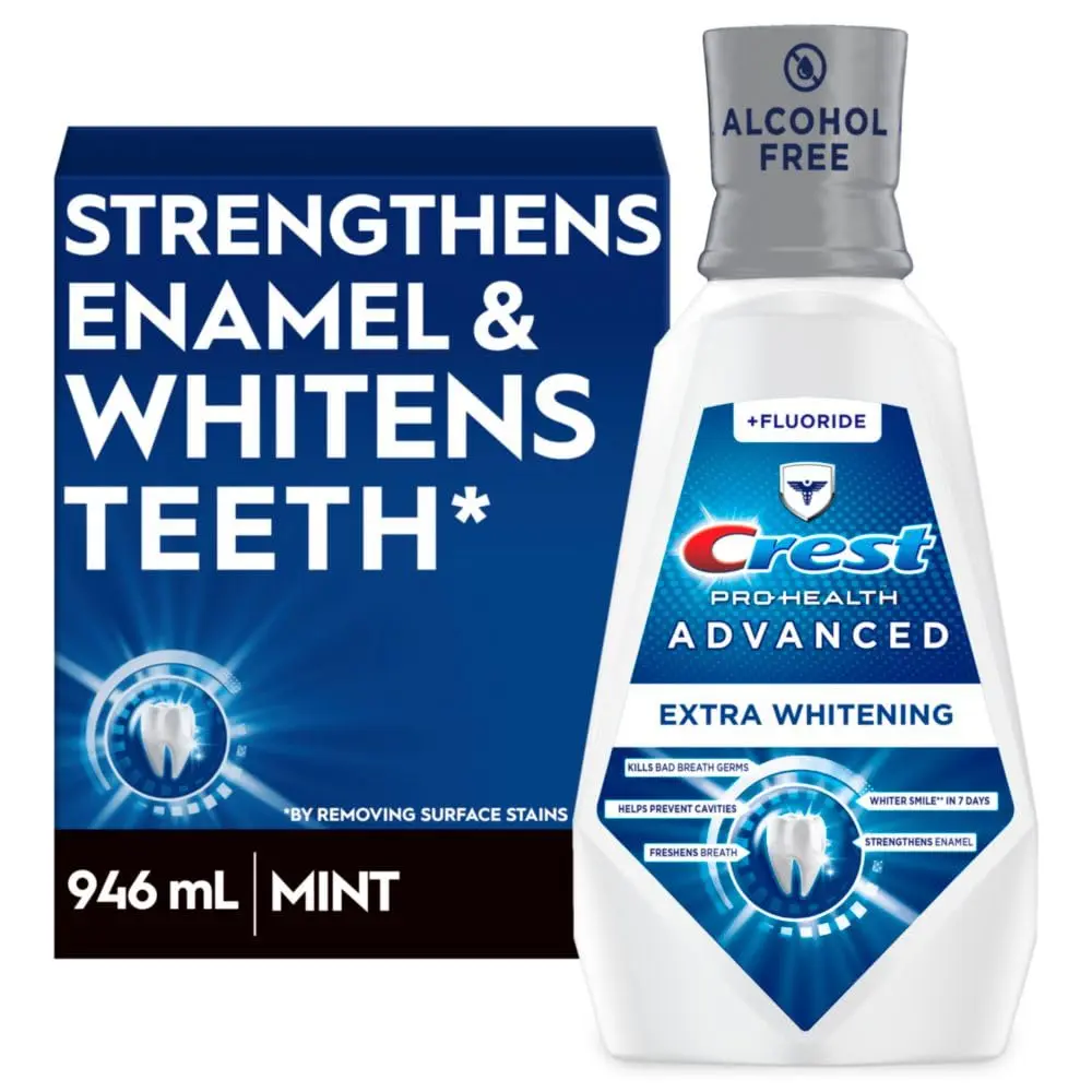 A bottle of Crest Pro-Health Advanced Mouthwash in Energizing Mint flavor, alcohol-free formula that safely whitens teeth by removing surface stains, strengthens enamel, prevents cavities, and kills bad breath germs without the burn.