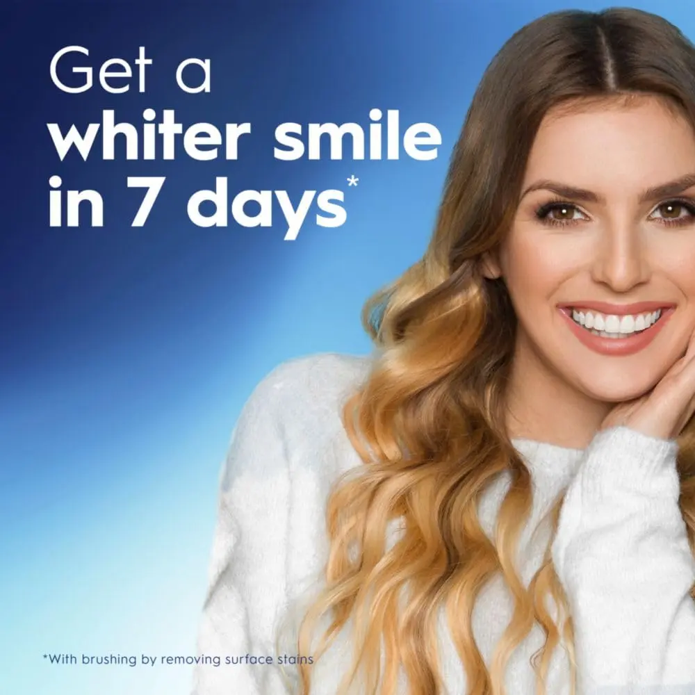 A bottle of Crest Pro-Health Advanced Mouthwash in Energizing Mint flavor, alcohol-free formula that safely whitens teeth by removing surface stains, strengthens enamel, prevents cavities, and kills bad breath germs without the burn.