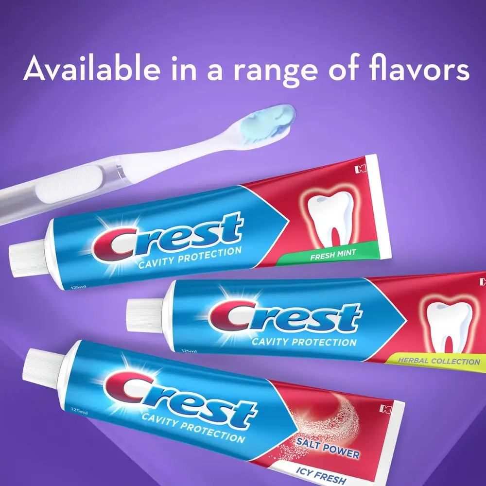 Two tubes of Crest Cavity Protection Fresh Mint Toothpaste provide professional teeth whitening results with deep cleaning action to gently and effectively remove tough stains.