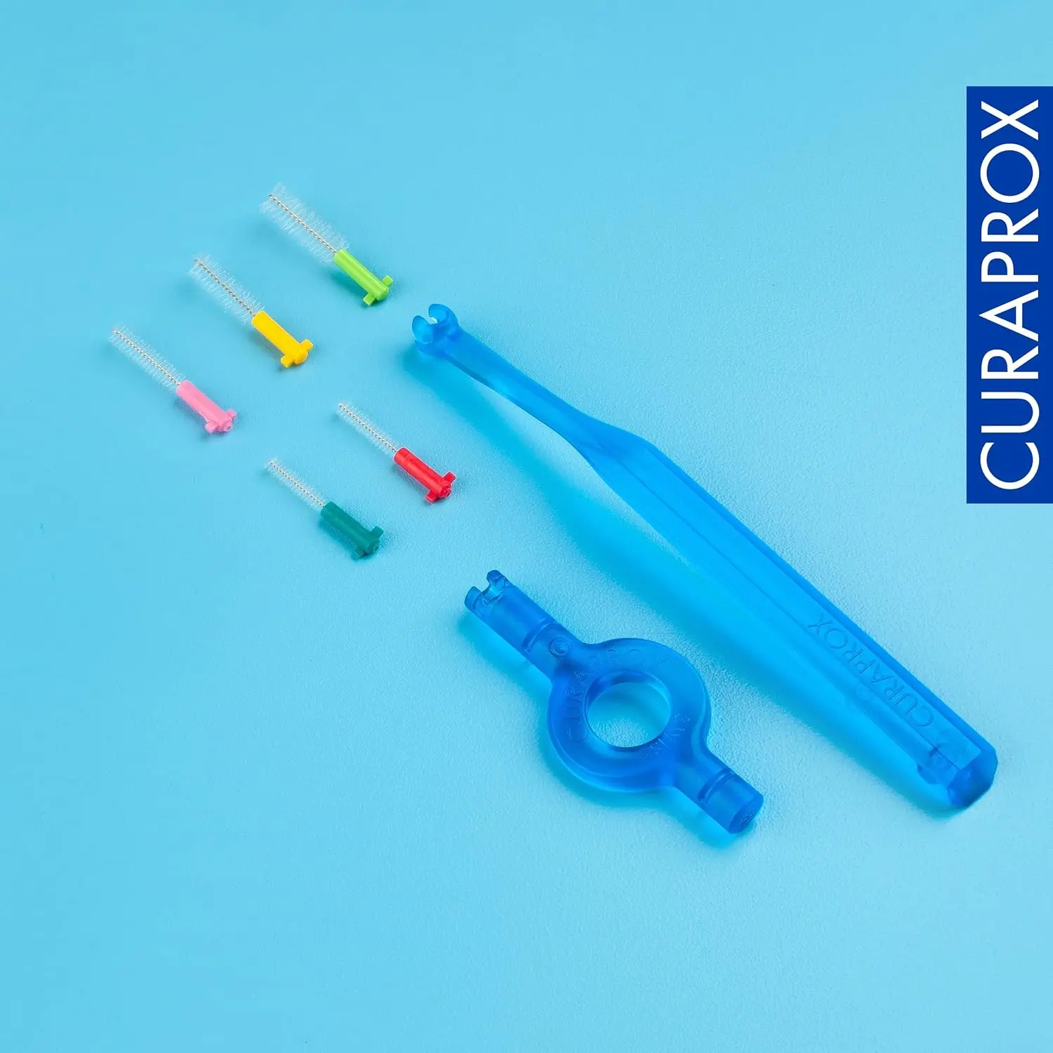This Curaprox interdental brush kit features five mixed-size brushes and two holders for gentle and effective plaque removal, promoting healthy gums.