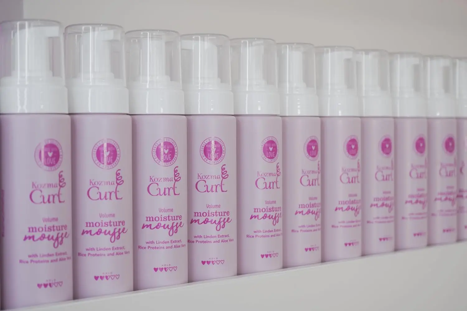 Kozma curl volume mousse enhances curls and waves with lightweight moisture and medium hold for frizz-free definition.