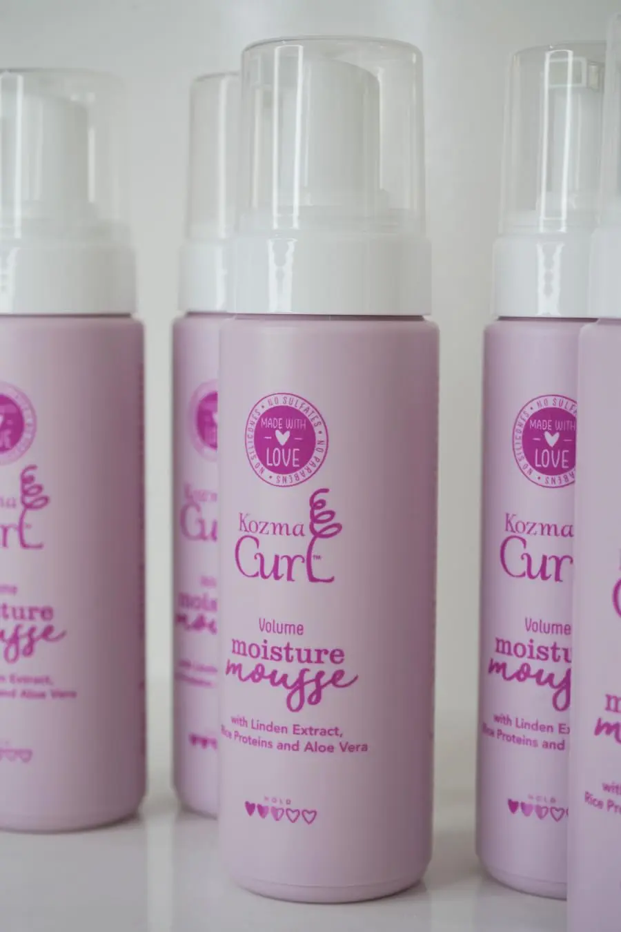 Kozma curl volume mousse enhances curls and waves with lightweight moisture and medium hold for frizz-free definition.