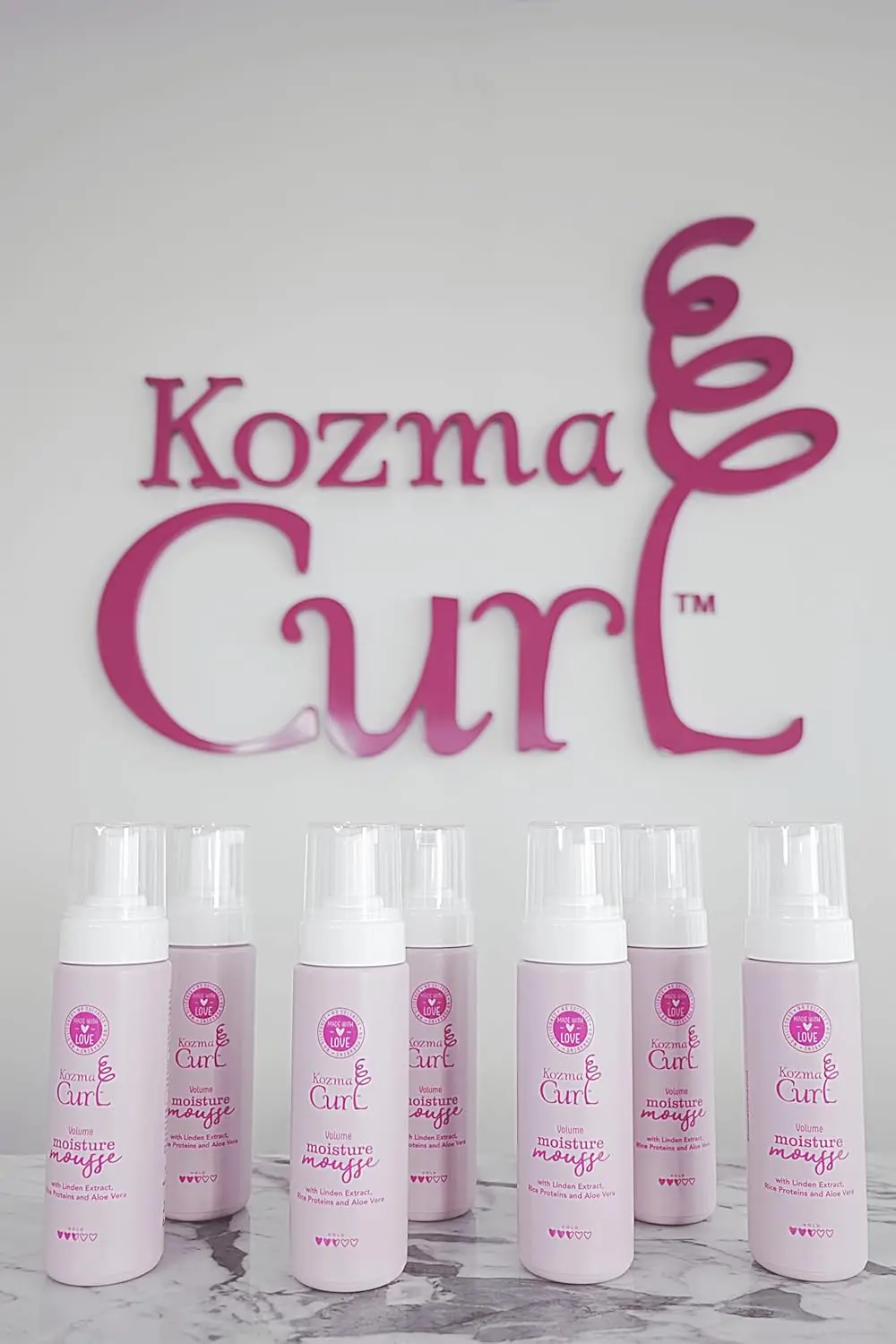 Kozma curl volume mousse enhances curls and waves with lightweight moisture and medium hold for frizz-free definition.
