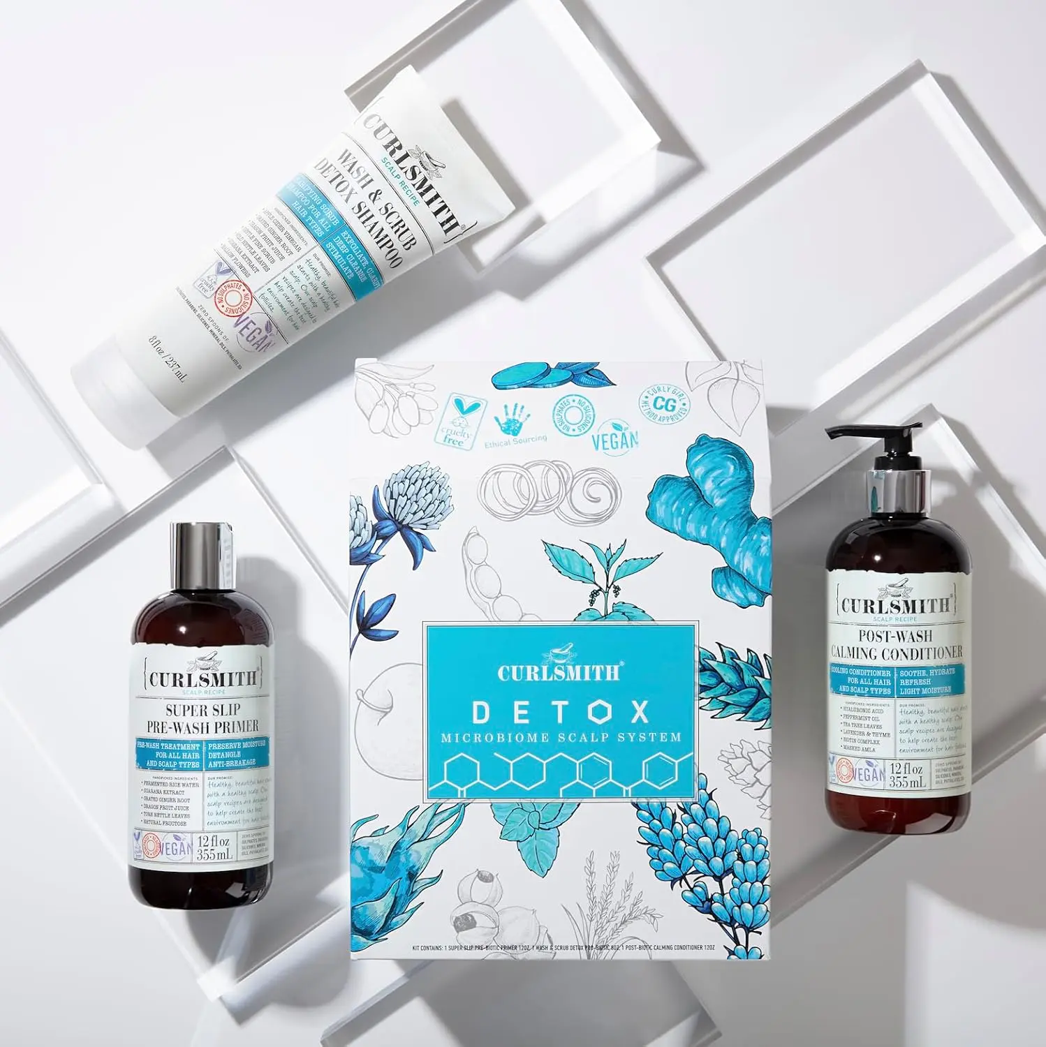 Curlsmith Detox Kit includes three vegan microbiome scalp products: Primer, Wash & Scrub, and Calming Conditioner, ideal for clarifying any hair type.