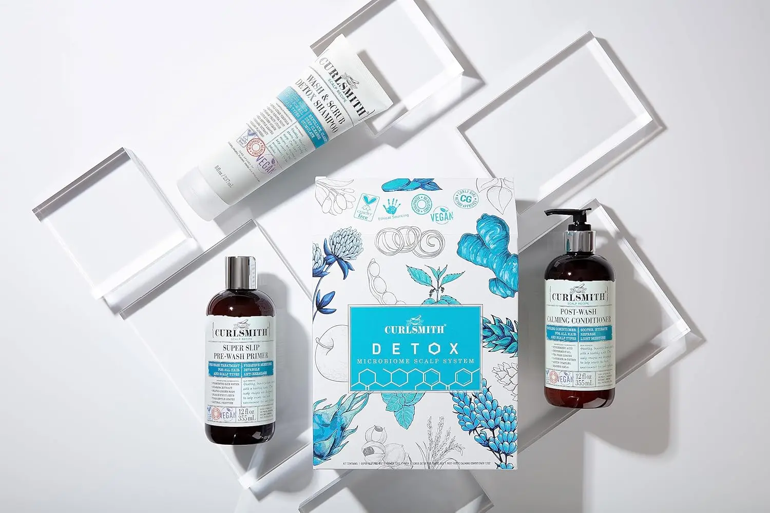 Curlsmith Detox Kit includes three vegan microbiome scalp products: Primer, Wash & Scrub, and Calming Conditioner, ideal for clarifying any hair type.