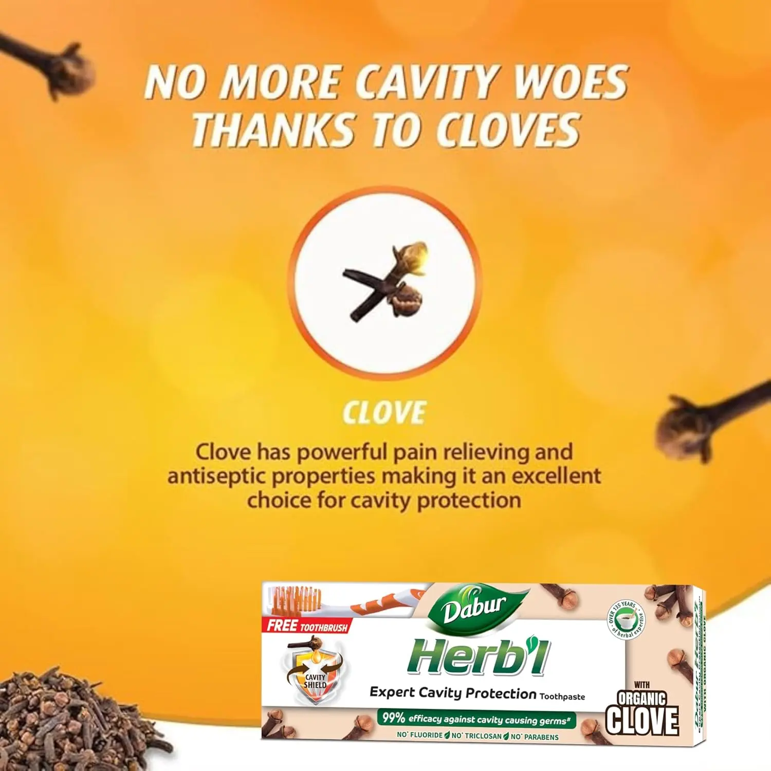 Dabur Herbal Clove toothpaste protects against cavities with natural ingredients and provides relief from toothache, shown with a bonus toothbrush.