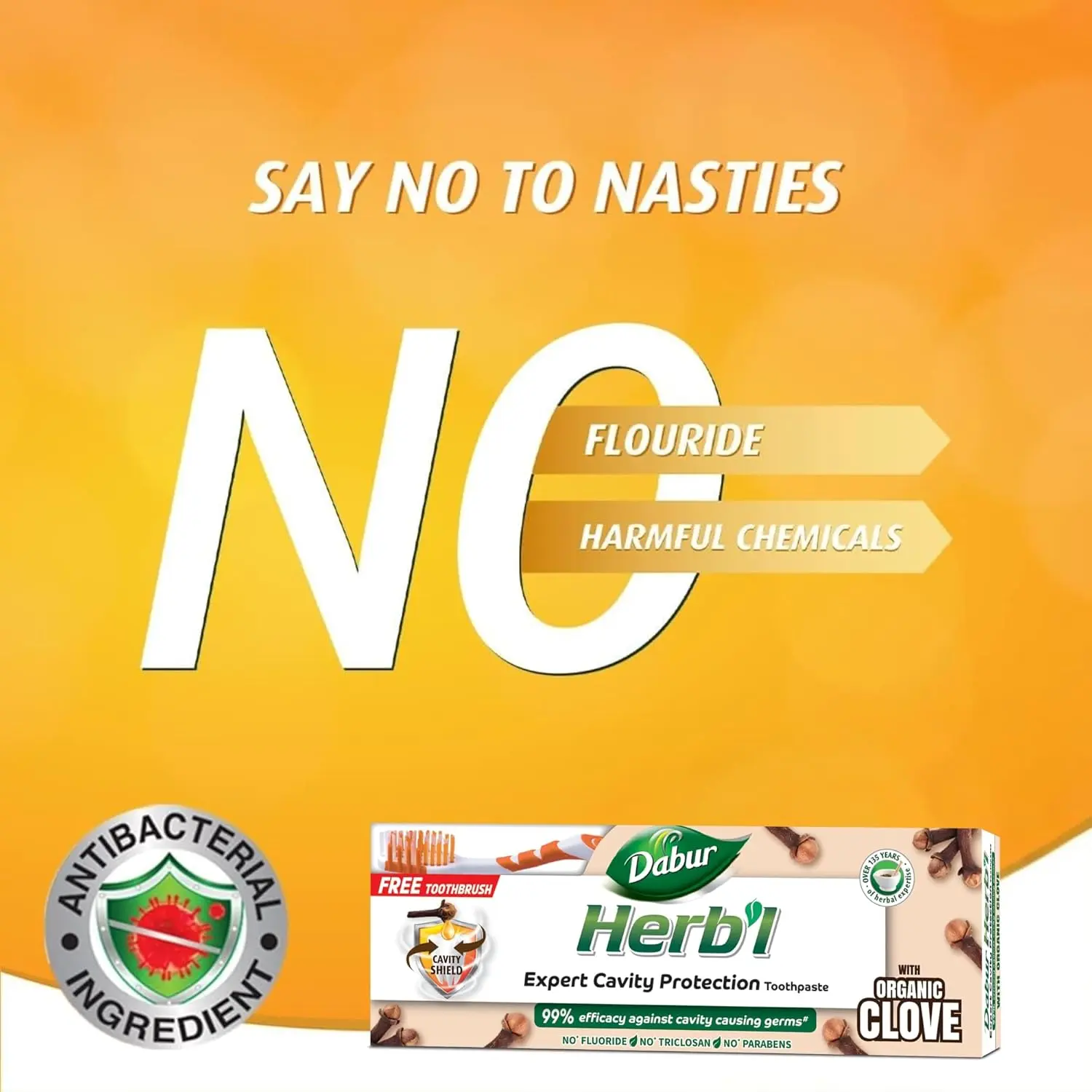 Dabur Herbal Clove toothpaste protects against cavities with natural ingredients and provides relief from toothache, shown with a bonus toothbrush.