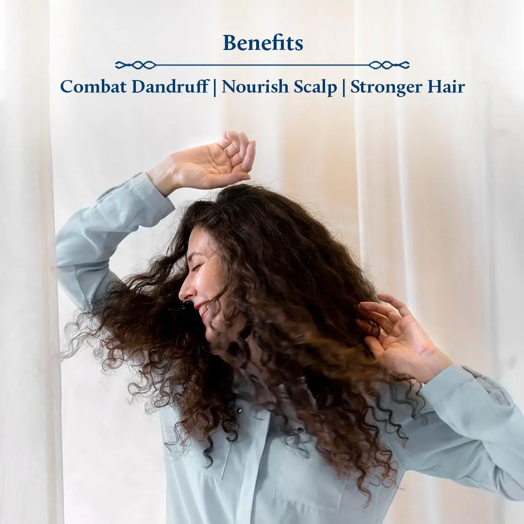 Blue Nectar anti-dandruff hair oil with tea tree and neem helps relieve itchy, dry scalp and reduces dandruff for men and women.