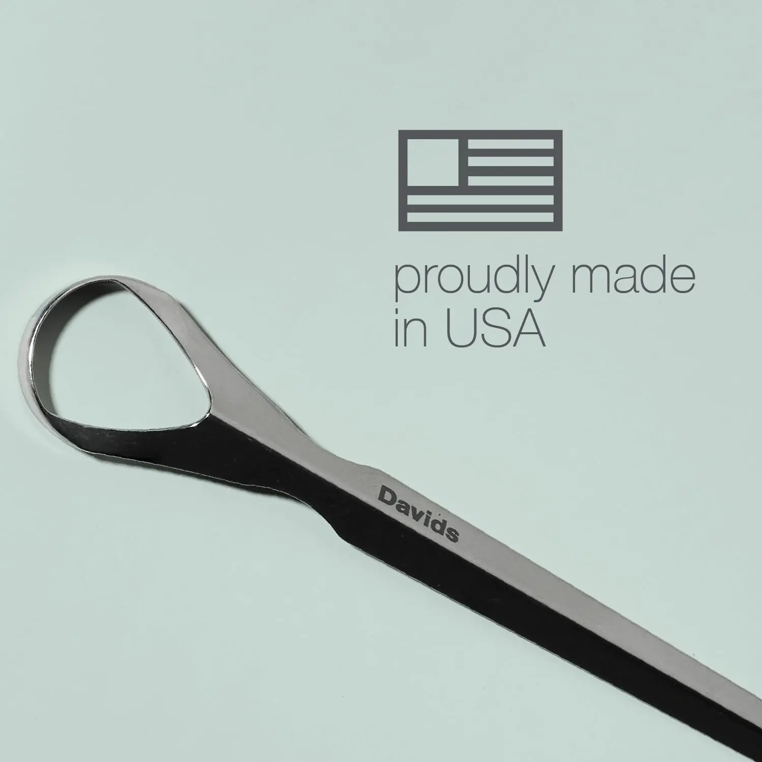 This stainless steel tongue scraper by Davids gently removes debris for improved oral hygiene and fresher breath, made in the USA.