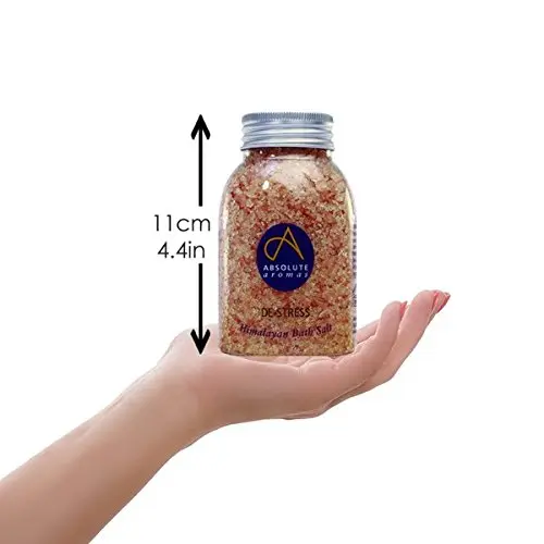 Pink Himalayan bath salts infused with chamomile, lavender, bergamot, and jasmine essential oils for a relaxing and detoxifying aromatherapy experience.