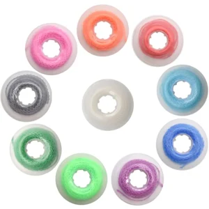 A colorful assortment of Angzhili orthodontic elastic power chains, designed for braces, providing excellent stretch and rebound, latex-free and hypo-allergenic.