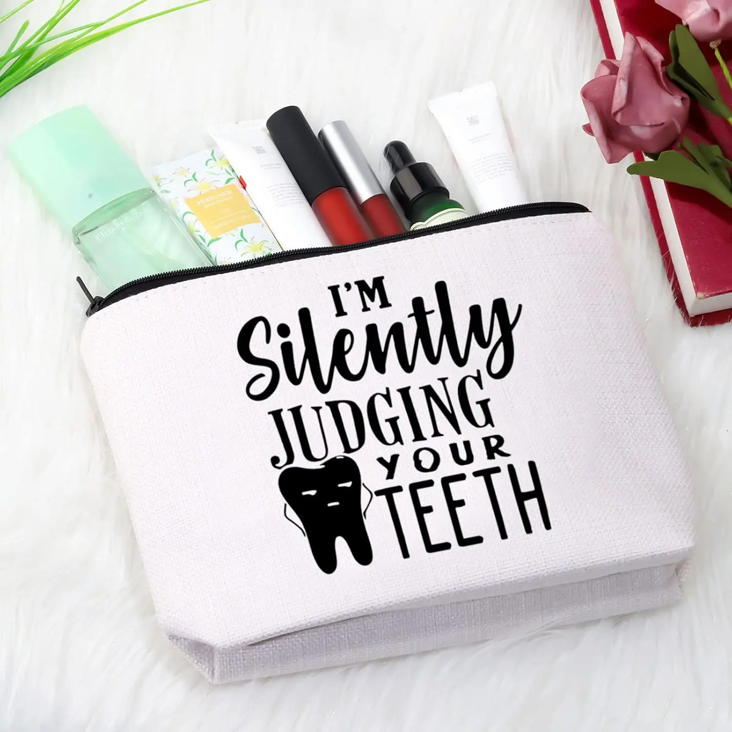 This canvas zipper pouch with "I'm Silently Judging Your Teeth" makes a funny and unique gift for dentists, dental hygienists, and dental assistants.