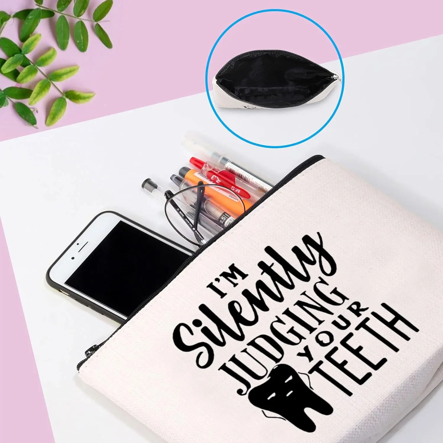 This canvas zipper pouch with "I'm Silently Judging Your Teeth" makes a funny and unique gift for dentists, dental hygienists, and dental assistants.