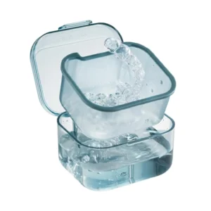 This blue denture bath box features a three-layer separation and includes a retainer case and soak container for easy denture cleaning and storage.