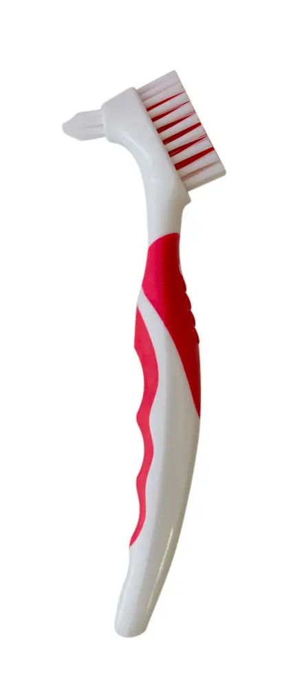 This Brush Buddies denture brush with an ergonomic handle is designed to effectively clean dentures, reaching areas that regular toothbrushes cannot.