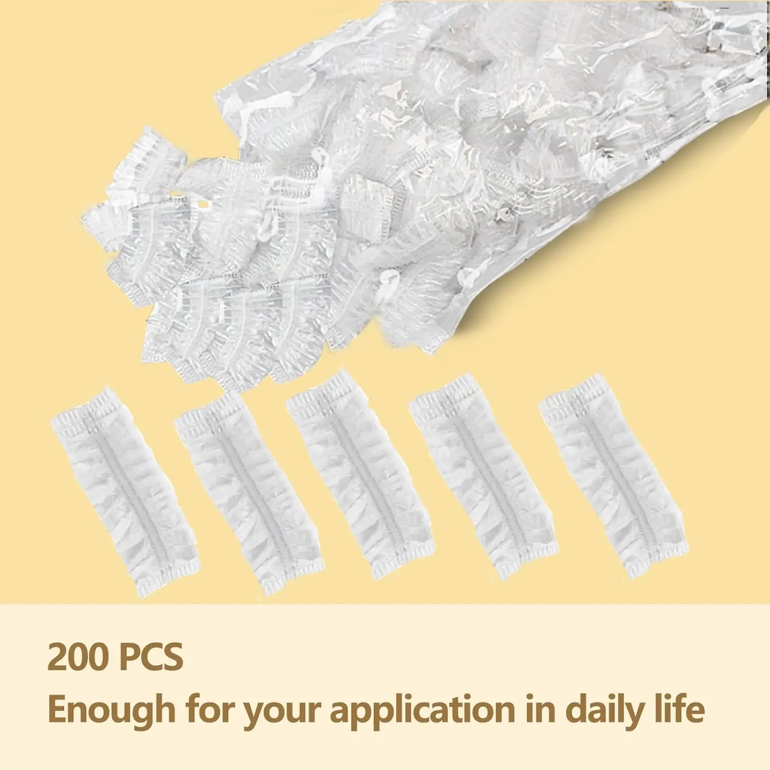 Two hundred clear disposable ear covers made of waterproof PE material, ideal for protecting ears during showers, hair dyeing, and salon treatments.