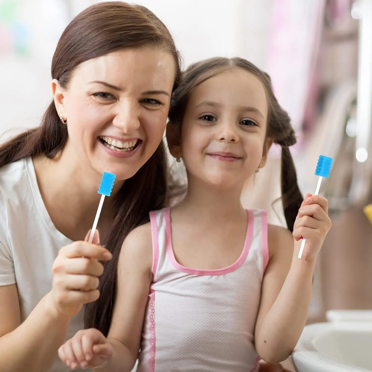 This image shows a bulk pack of 500 individually wrapped blue disposable oral swabs with soft sponge tips and strong PP handles for easy and safe mouth cleaning.