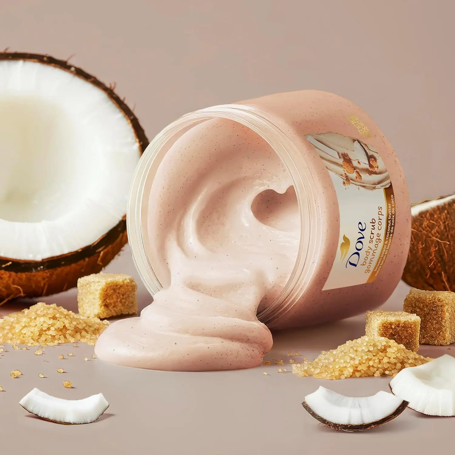 Dove Brown Sugar and Coconut Butter Body Scrub gently exfoliates and nourishes, revealing smooth, radiant skin.