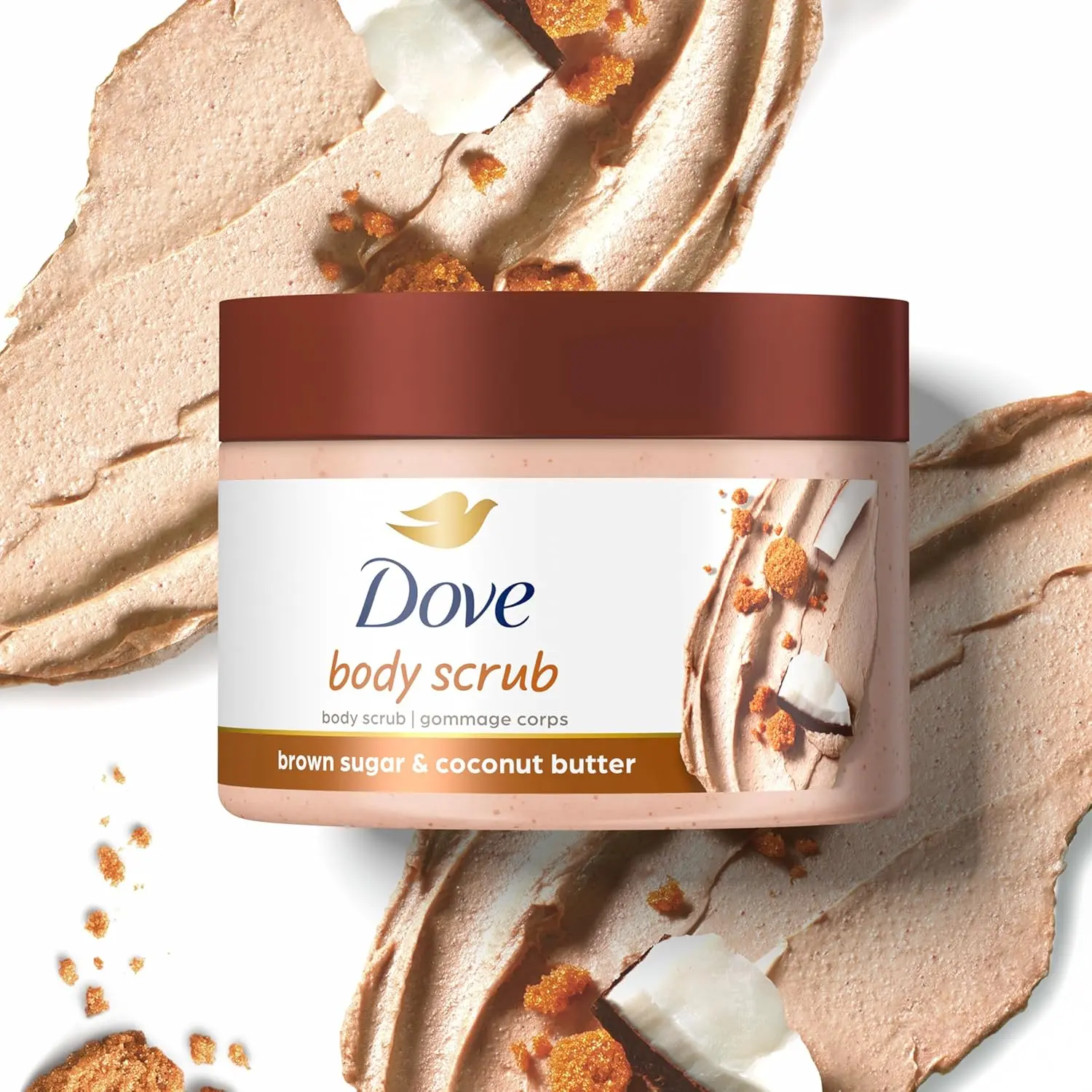 Dove Brown Sugar and Coconut Butter body scrub gently exfoliates to remove dry, dull skin, revealing radiant, silky-smooth skin.