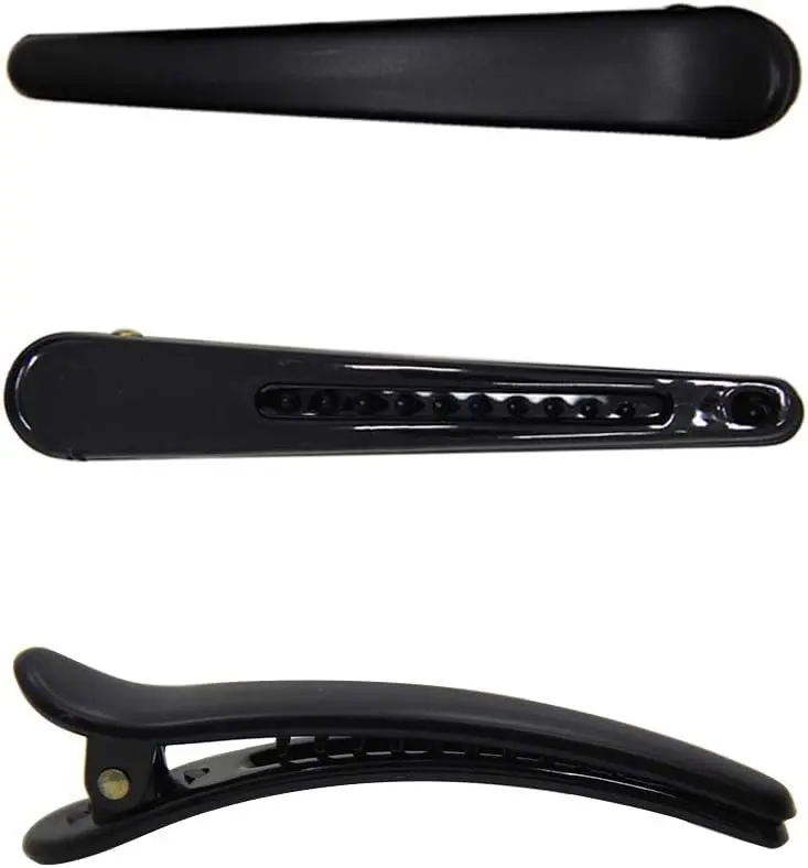 This image shows twelve durable plastic duckbill hair clips with a double prong design, ideal for creating curls and holding all hair types securely in salons or at home.