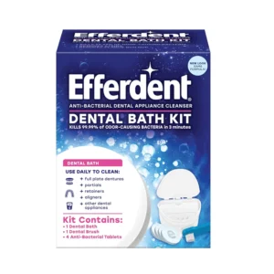 Efferdent retainer and denture cleaner kit with tablets, dental bath, and brush for a complete and antibacterial clean.
