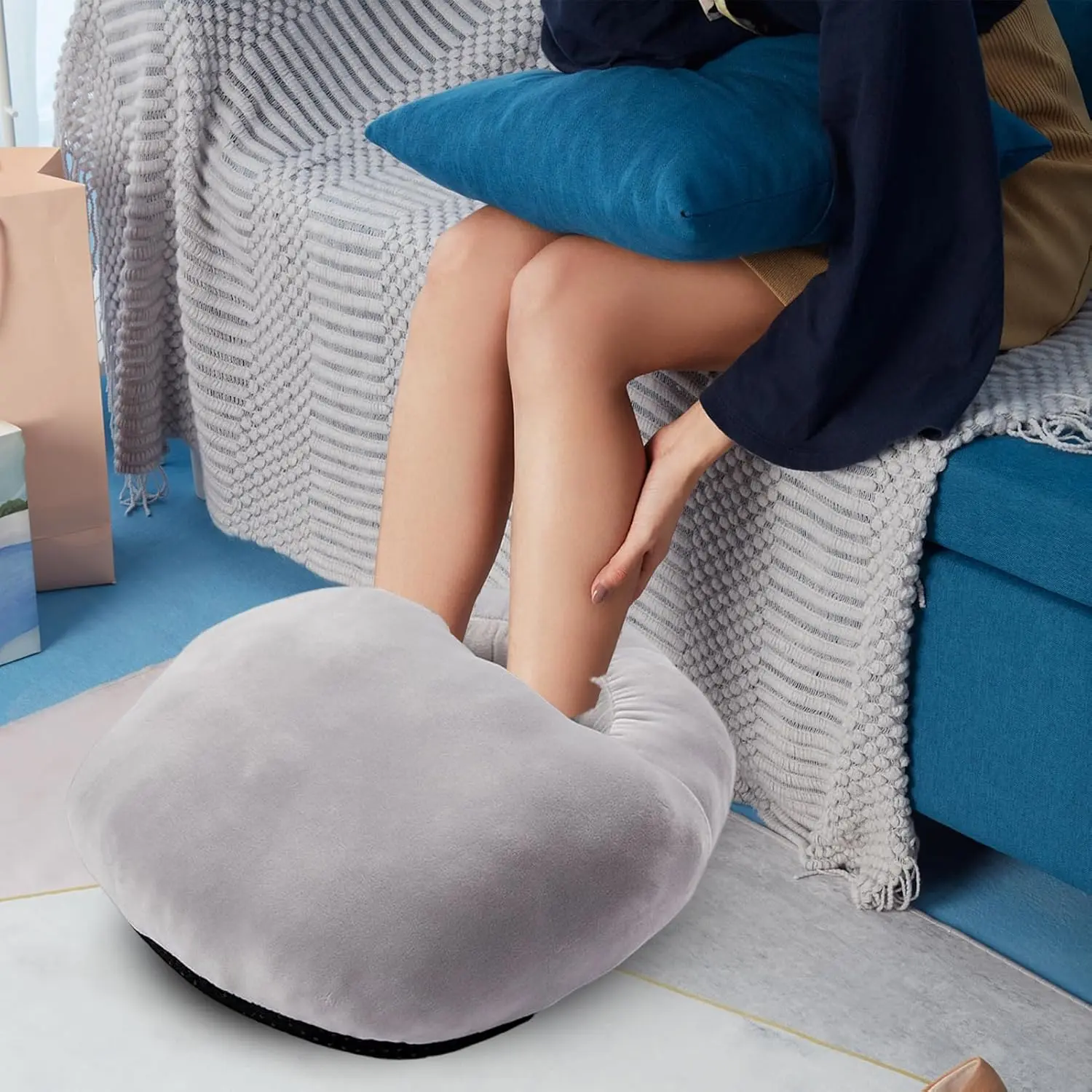 This electric foot warmer heating pad provides safe and consistent warmth for under desk use in home offices and relaxation zones, featuring smart temperature control, overheat protection, and a washable liner.