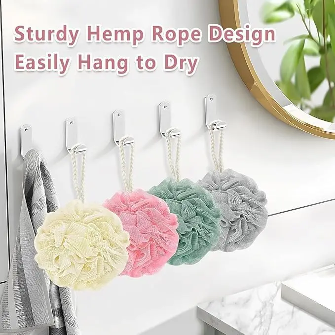 Double-sided exfoliating bath mitts in assorted vibrant colors gently remove dead skin cells and improve circulation for both men and women.