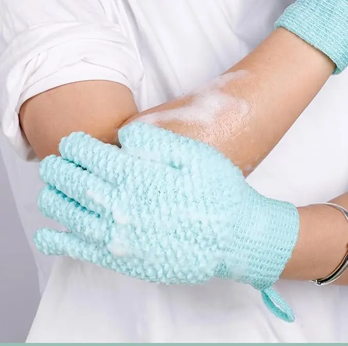 A pair of green exfoliating gloves for shower and body scrubs, with a hanging loop.