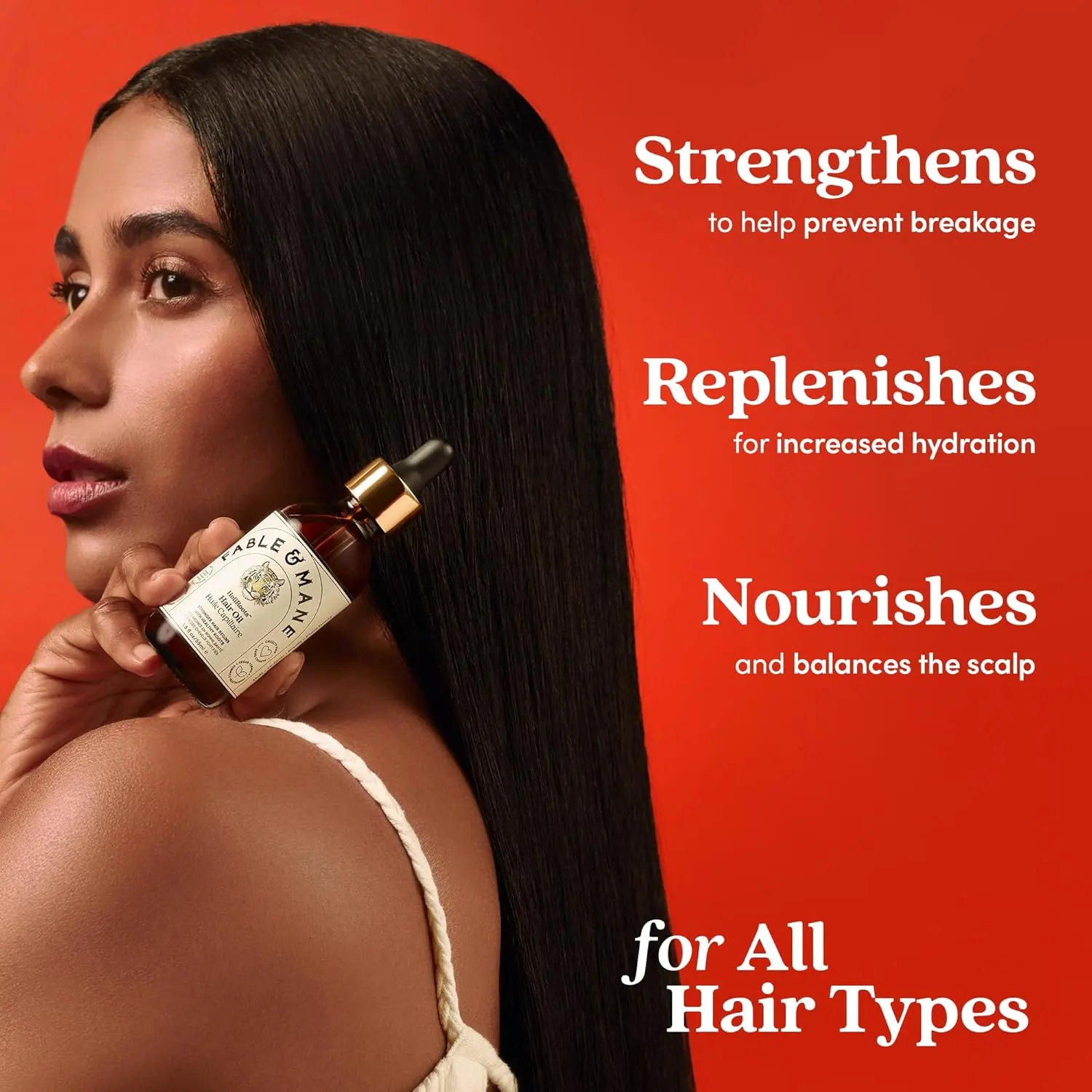 Fable and Mane HoliRoots hair oil for strengthening and treating dry, damaged hair and promoting growth.