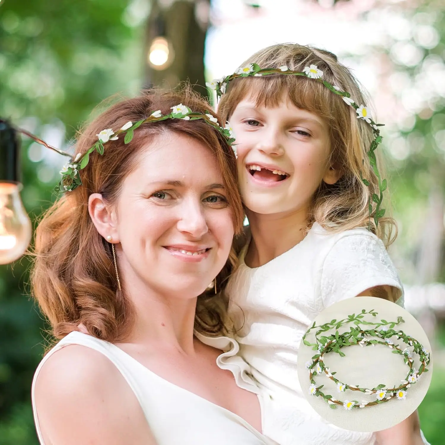 Two handmade flower crown headbands with artificial daisies, silk flowers, and green leaves, perfect for weddings and adding a bohemian touch to any hairstyle.