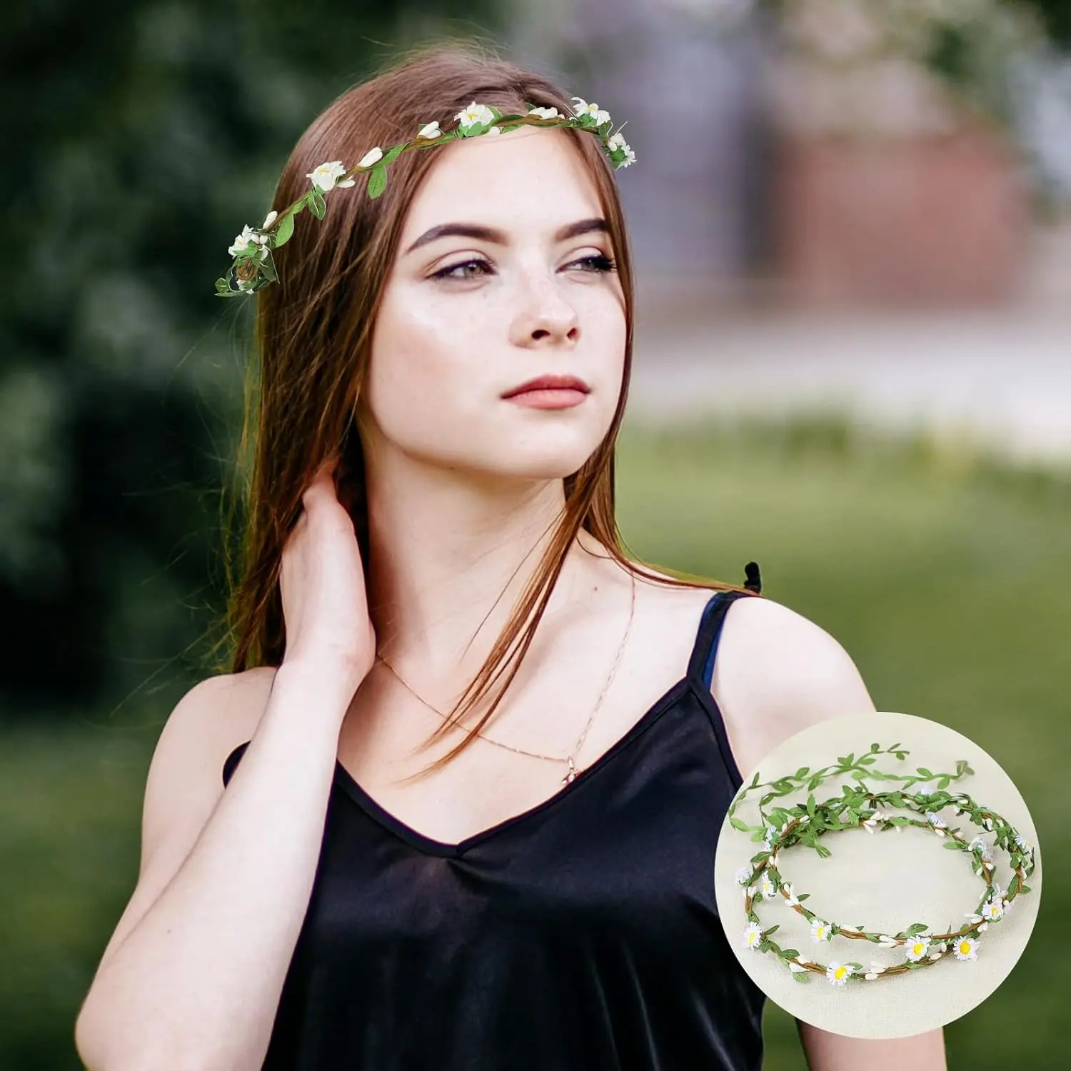Two handmade flower crown headbands with artificial daisies, silk flowers, and green leaves, perfect for weddings and adding a bohemian touch to any hairstyle.