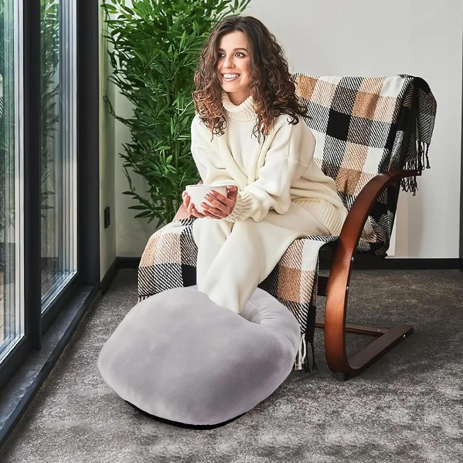 This heated foot warmer provides cozy, consistent warmth for cold feet in your home office or living room, featuring overheat protection and a washable liner for comfortable use.