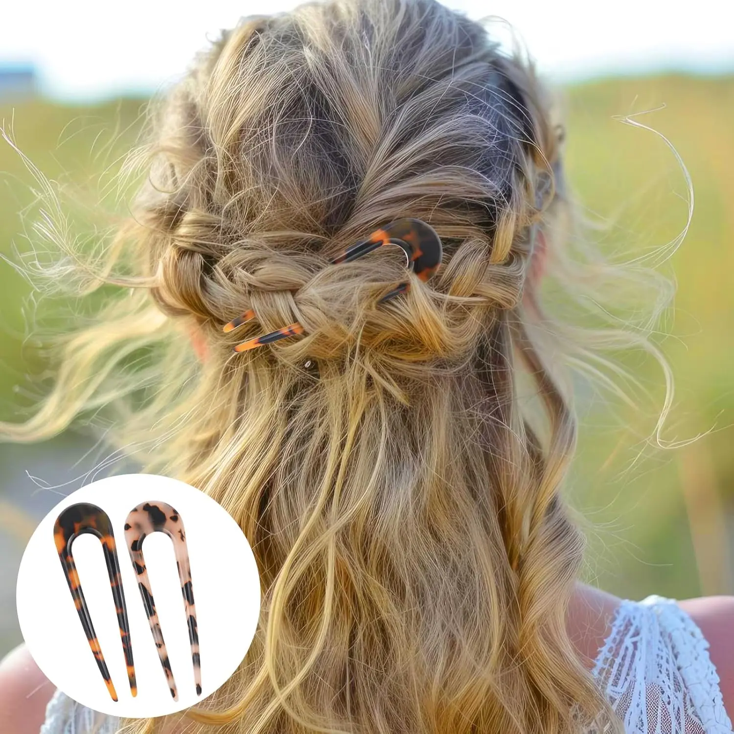 This image shows a set of two tortoise shell U-shaped hair forks, perfect for creating elegant French twists and buns for women and girls.