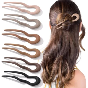 Six U-shaped french hair pins are displayed, designed for styling thick hair in a chignon or twist.