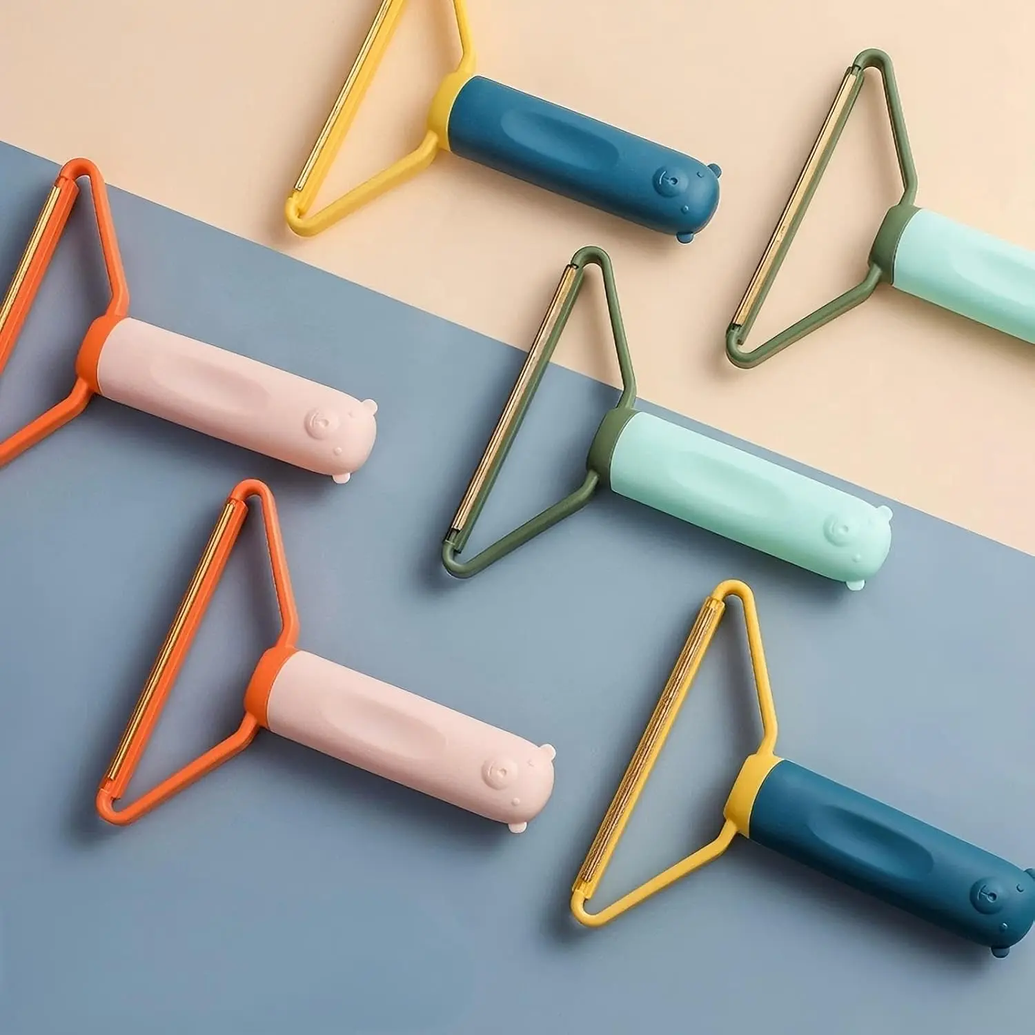 A green manual fuzz shaver is shown removing lint and pet hair from a couch, effectively cleaning furniture.