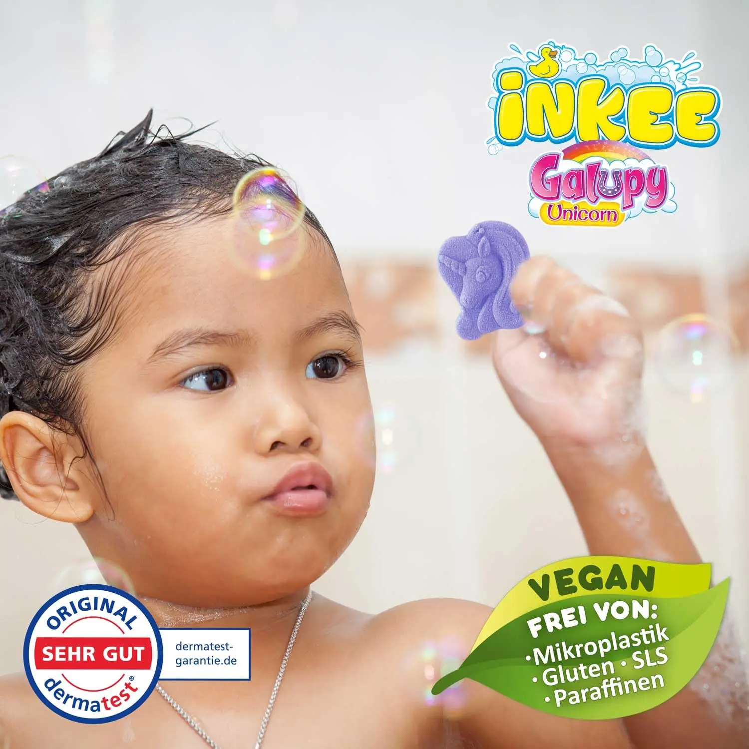 Three colorful Galupy unicorn bath bombs for children in pink, purple, and turquoise with bubblegum scent and jojoba oil, perfect for gentle and fun bathing.